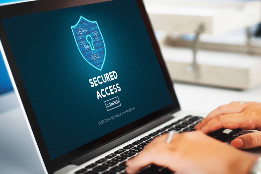 A Laptop screen showing a secure symbol with the secured access written beneath it, used to depict the best practices to ensure secure remote access